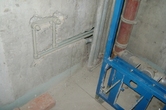 штробление стены под трубы в ванной